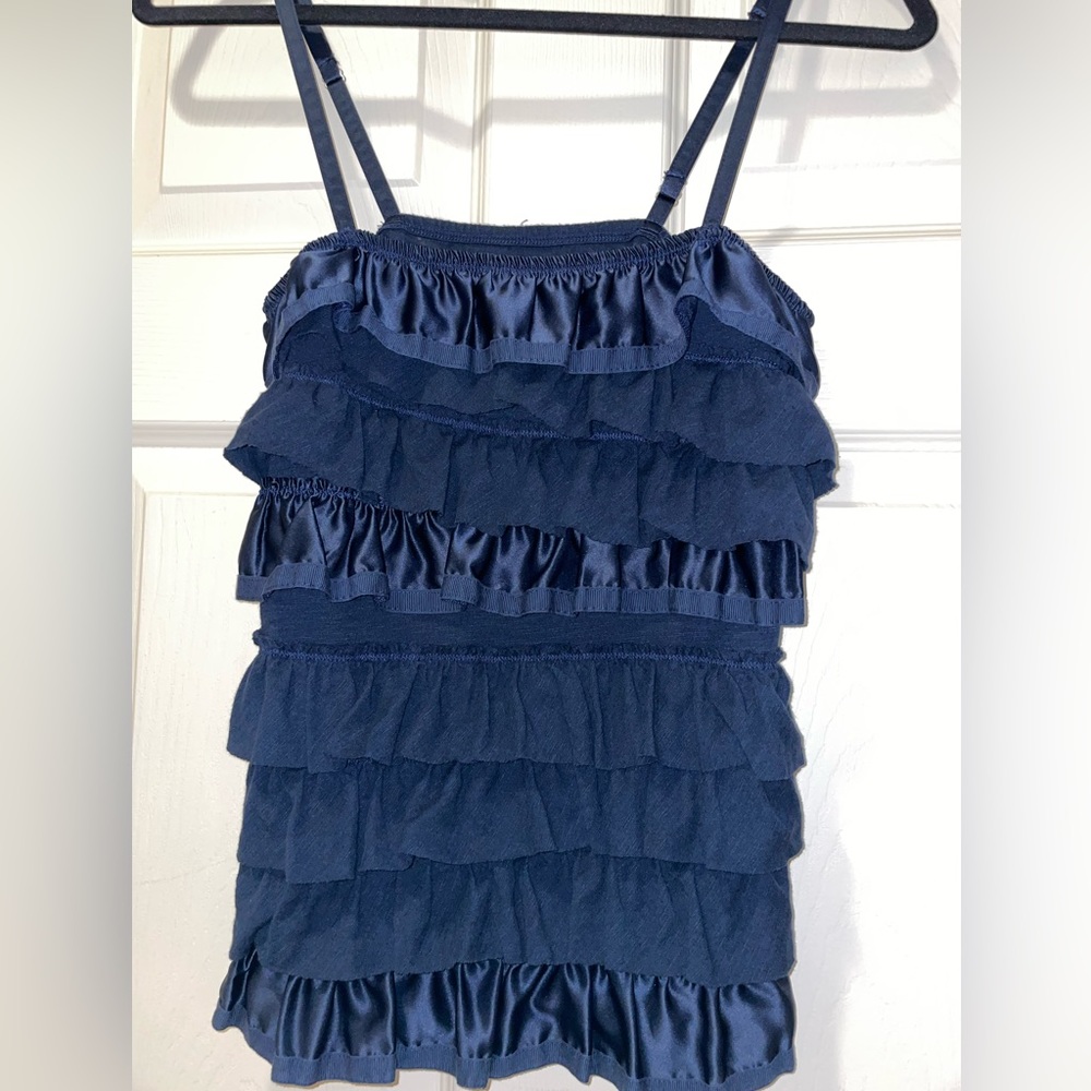 Navy spaghetti strap top.   Satin and ribbon accents.  Adjustable straps.